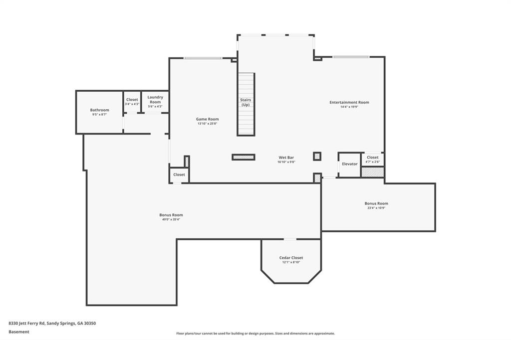Basement floor plan with a game room, entertainment room, wet bar, bonus rooms, and cedar closet.