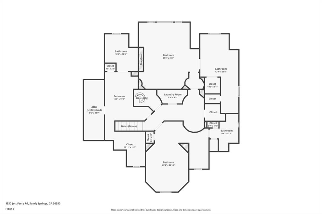 Third-floor plan showing three bedrooms, bathrooms, a laundry room, unfinished attic, and stairs.