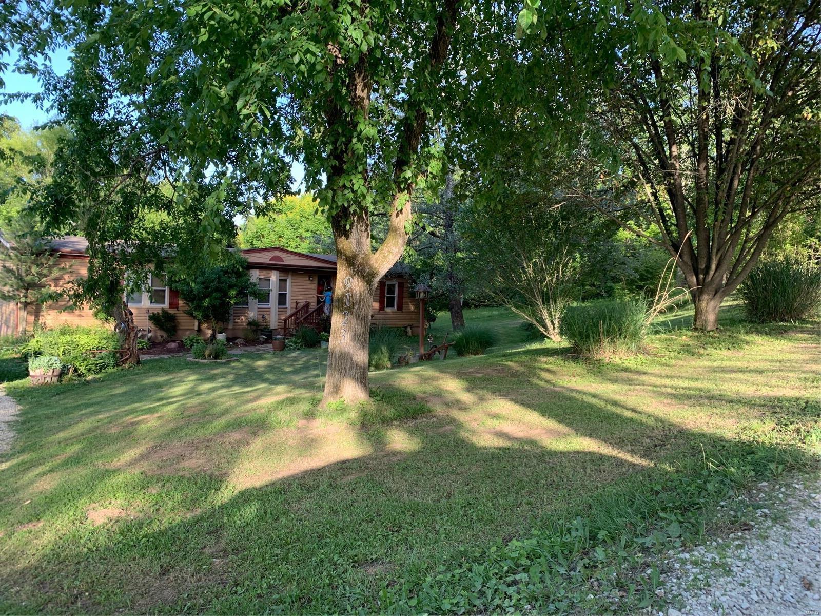 9123 Woodland Trail Drive