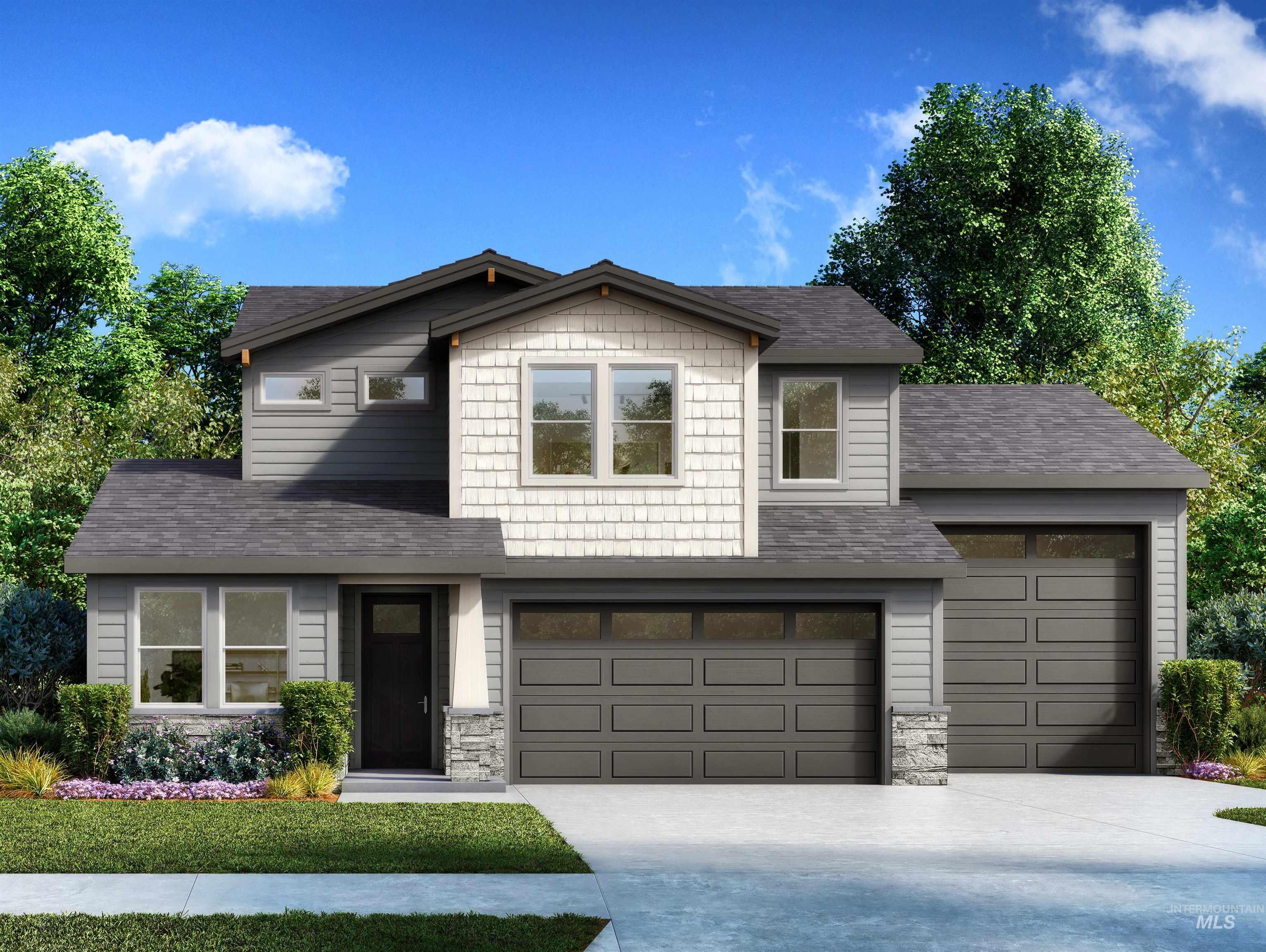 Two-story gray and white house with twin garage doors, landscaped front yard, and driveway.