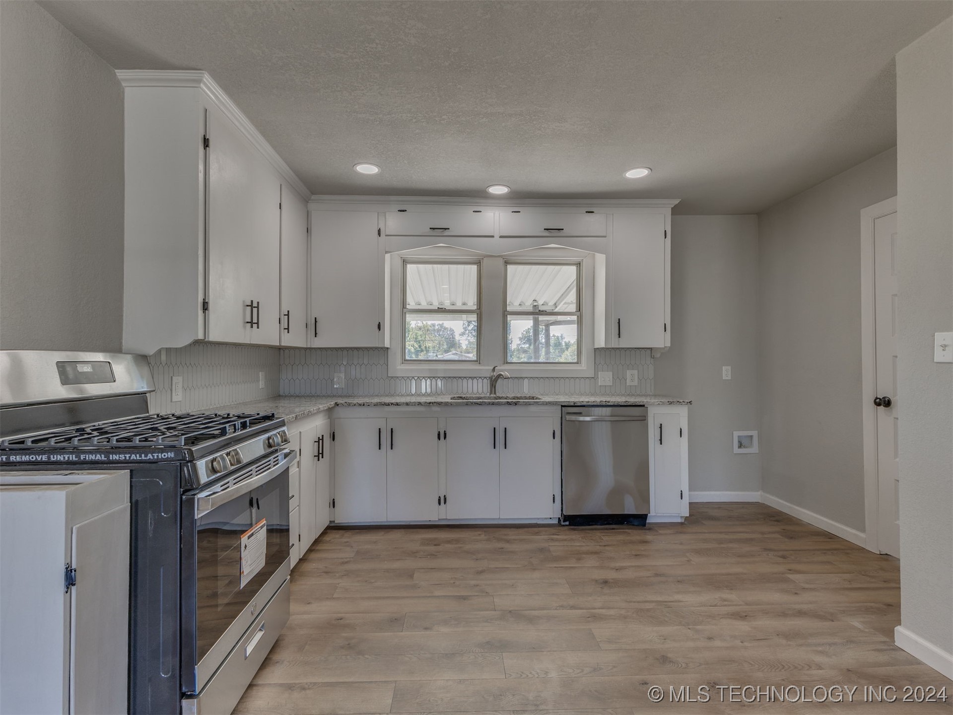 6304 E 4th Place
