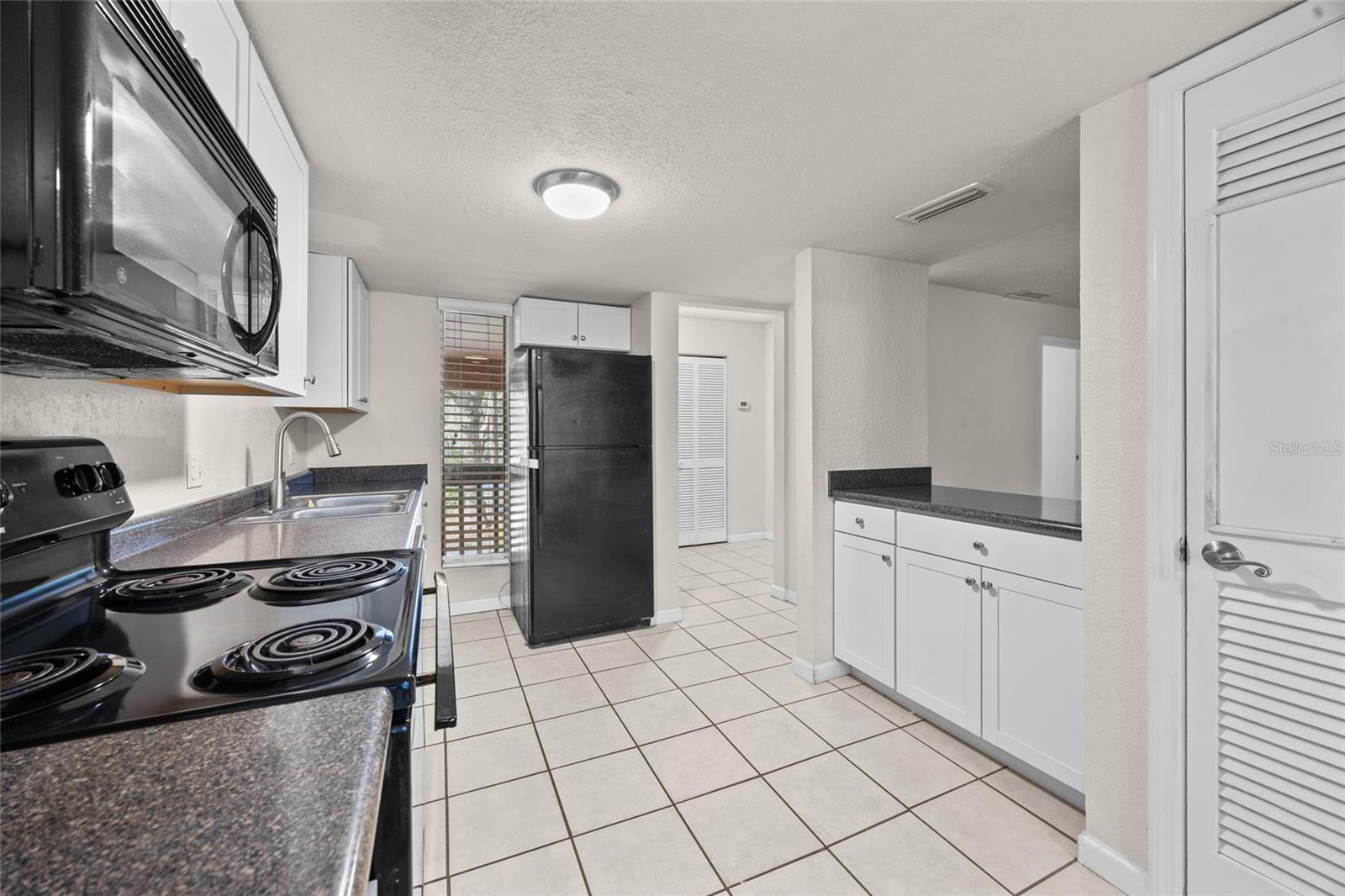 1810 NW 23RD BLVD #203