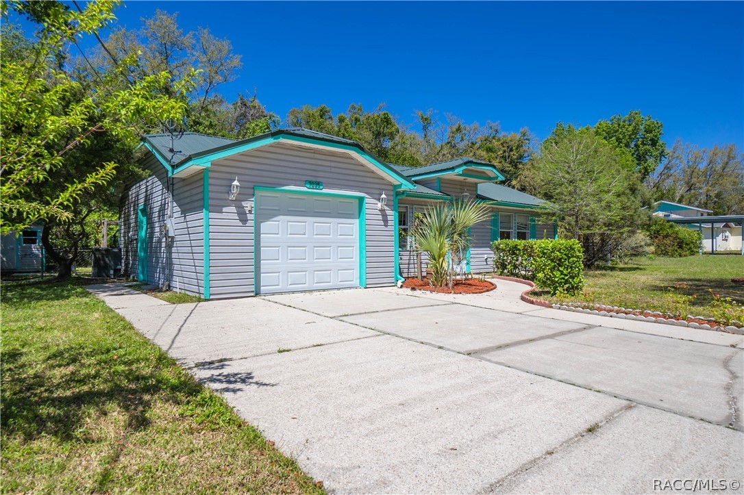 7035 W Village Drive