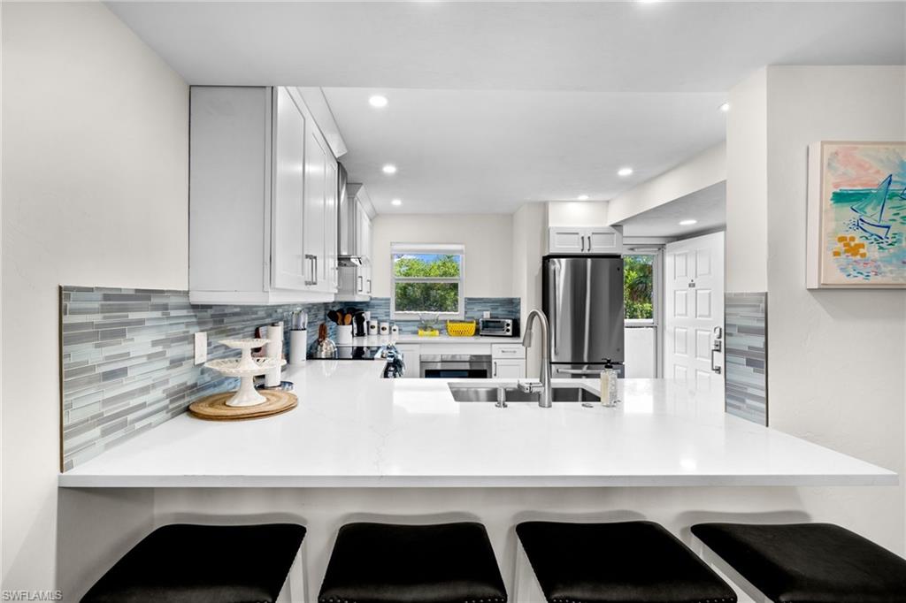 12945 VANDERBILT DR Unit: 203