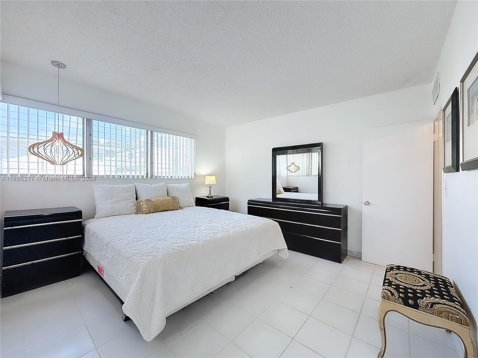 10081 W Bay Harbor Dr # 1