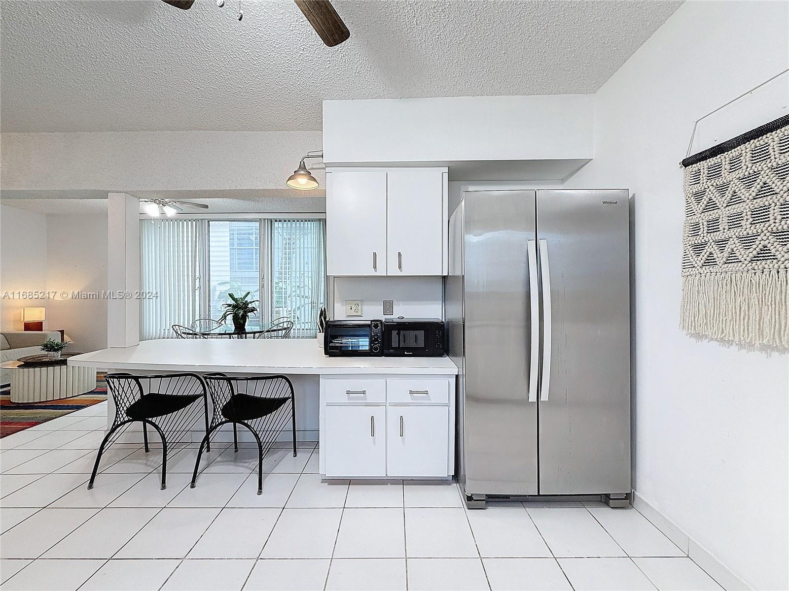 10081 W Bay Harbor Dr # 1