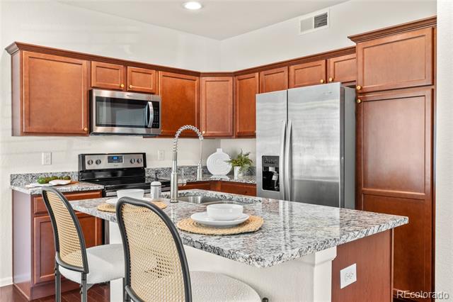 15195 E 16th Place Unit: 104
