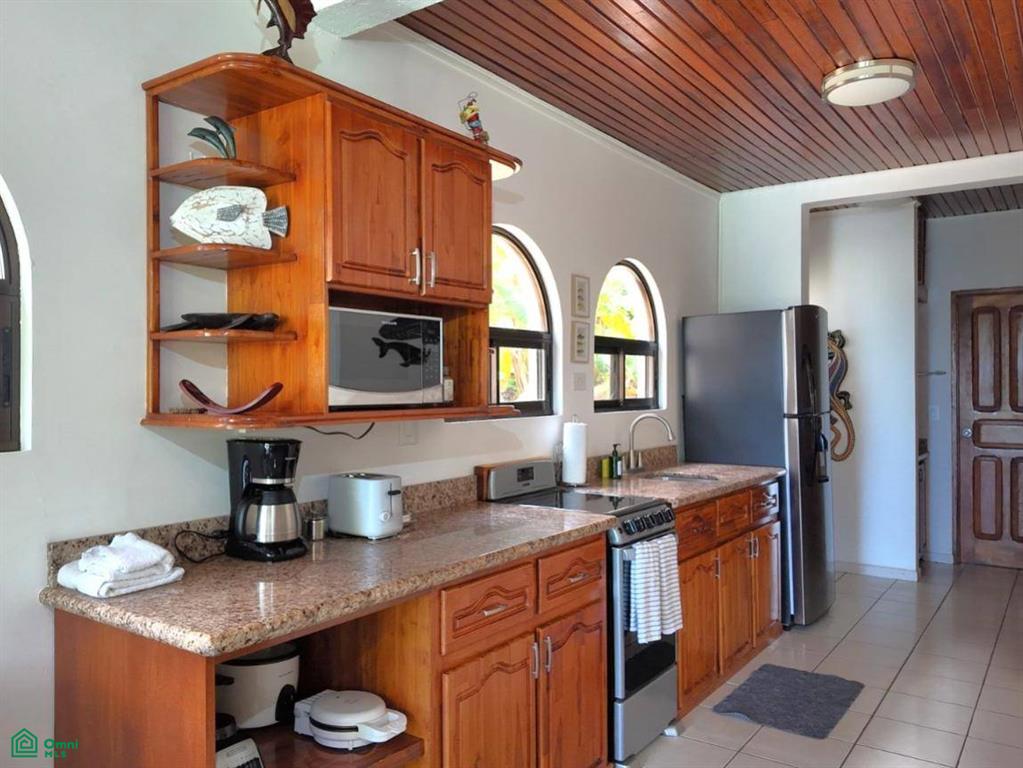 Turnkey Beachfront Condo – Flamingo Marina Cove Punta Indio 405 , Playa Flamingo, Guanacaste