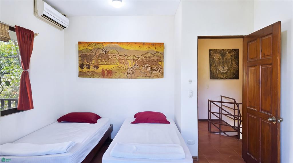 Casa Rosada Lomas de Conchal - Playa Puerto Viejo