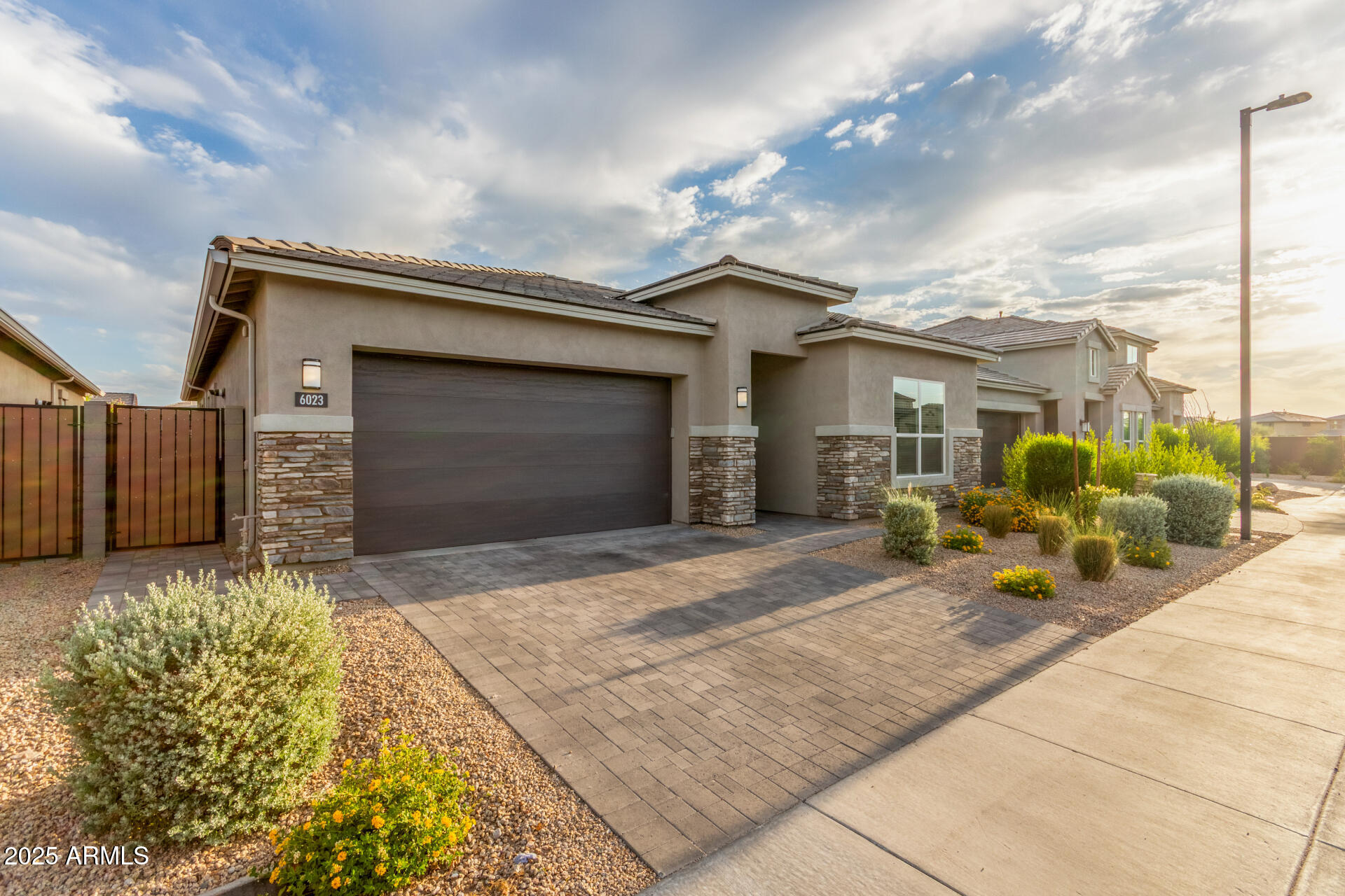 6023 E SINCLAIR Street