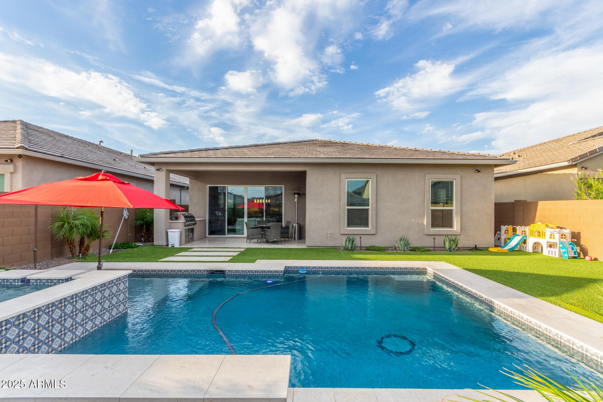 6023 E SINCLAIR Street