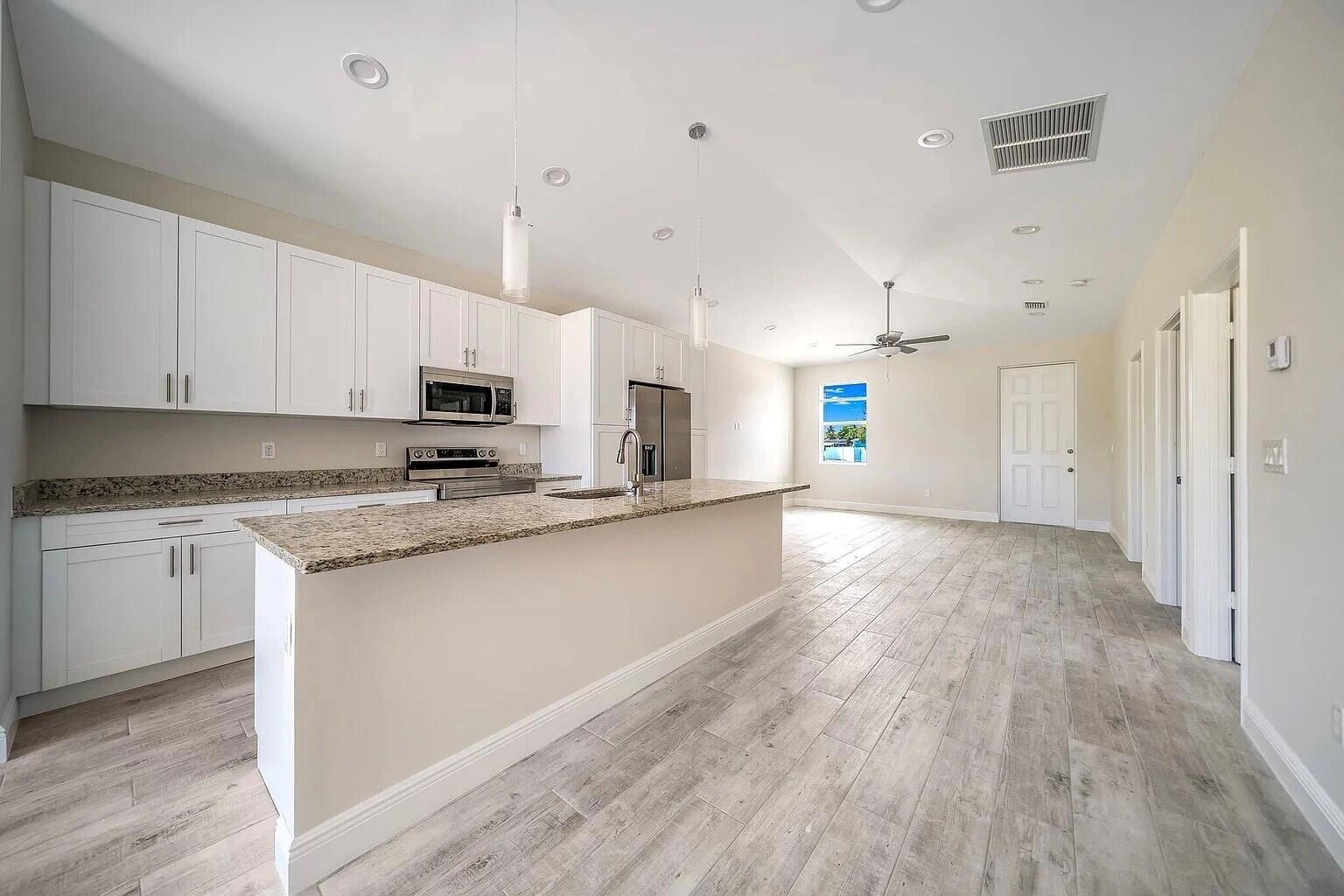 1554-1558 W 26th Court