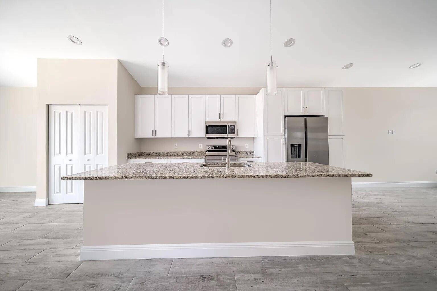 1562-1566 W 26th Court