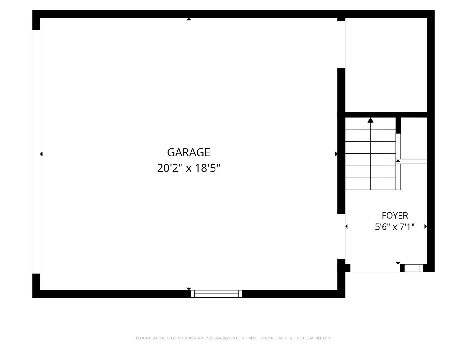 Floor plan showing a garage, foyer, and staircase with room dimensions.