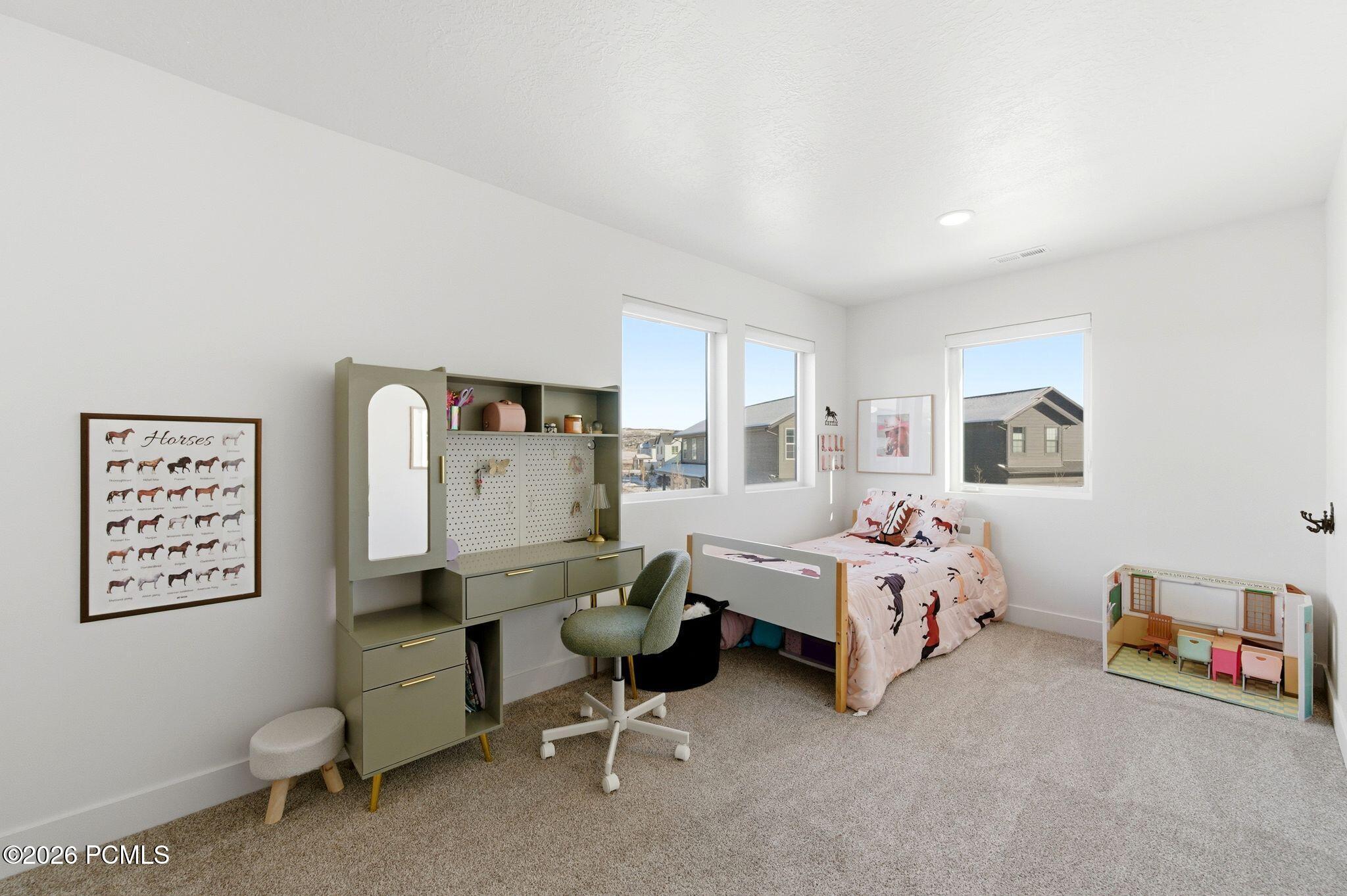 6943 Woods Rose Drive