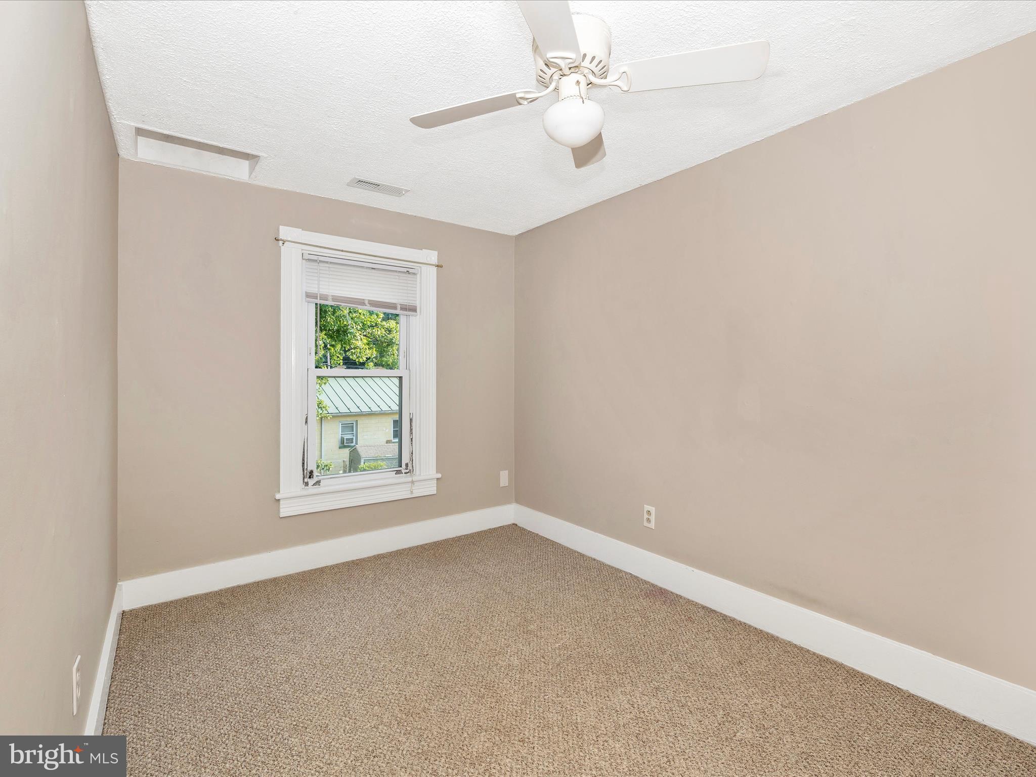113 W B St