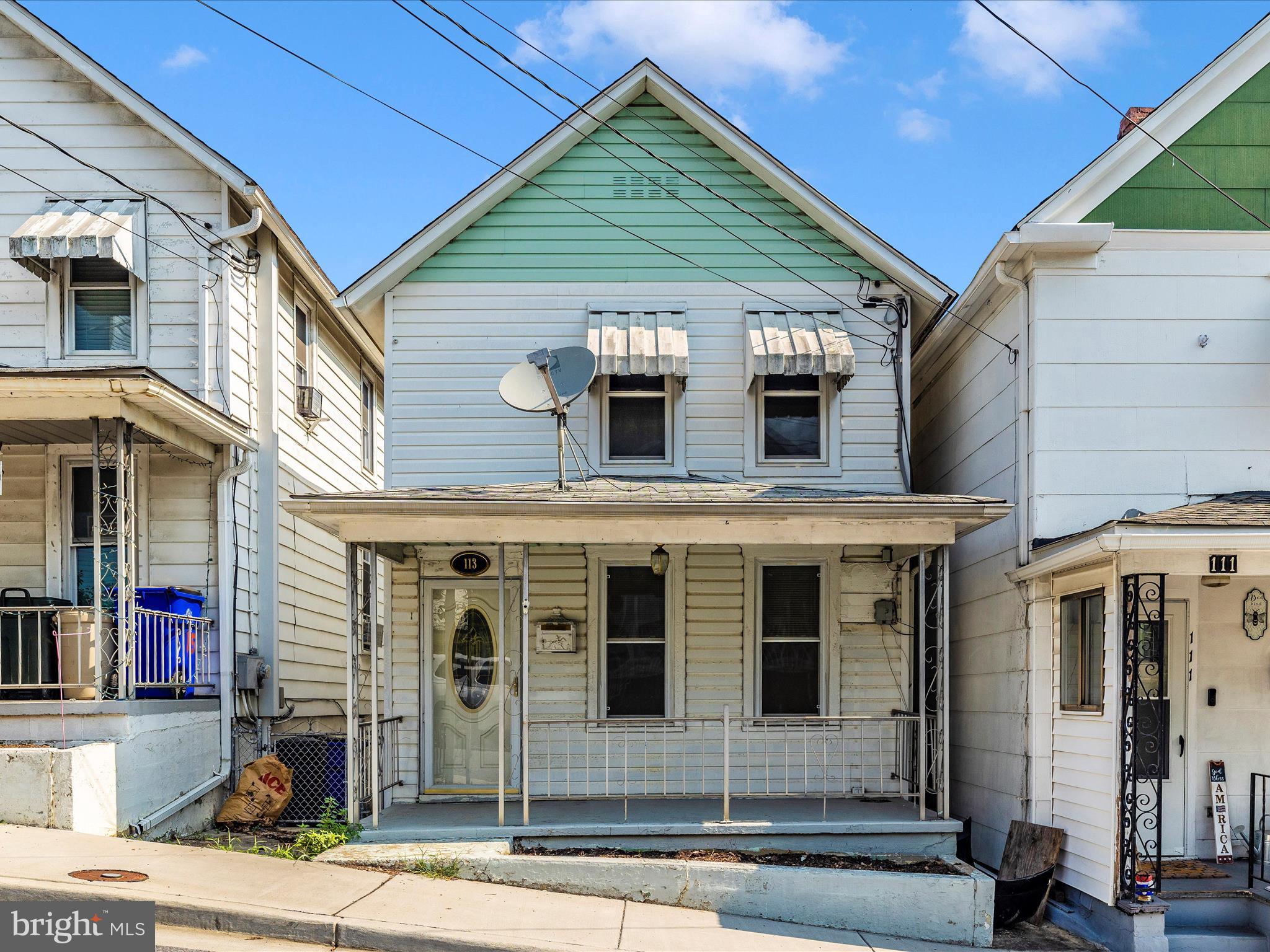 113 W B St