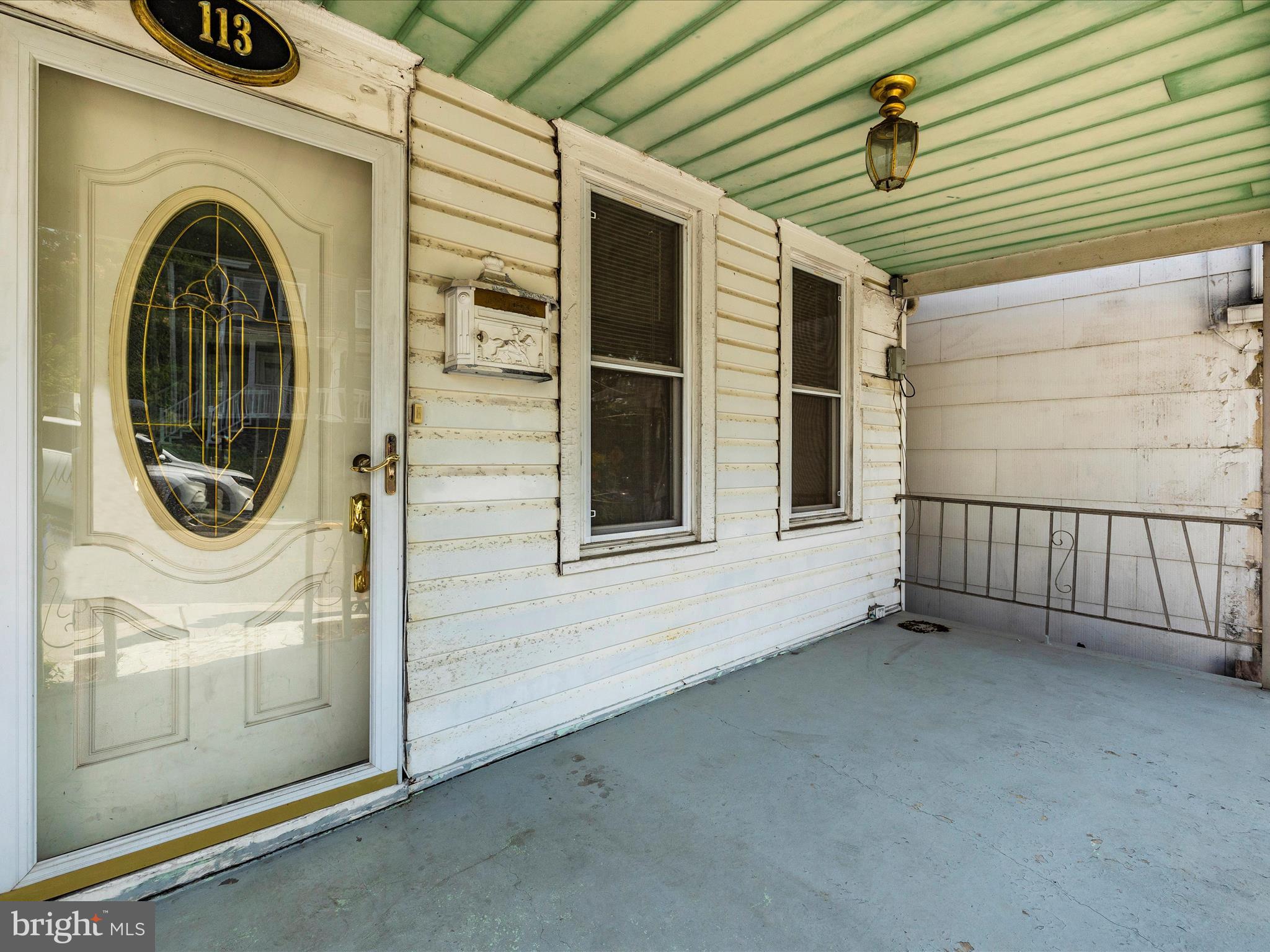113 W B St
