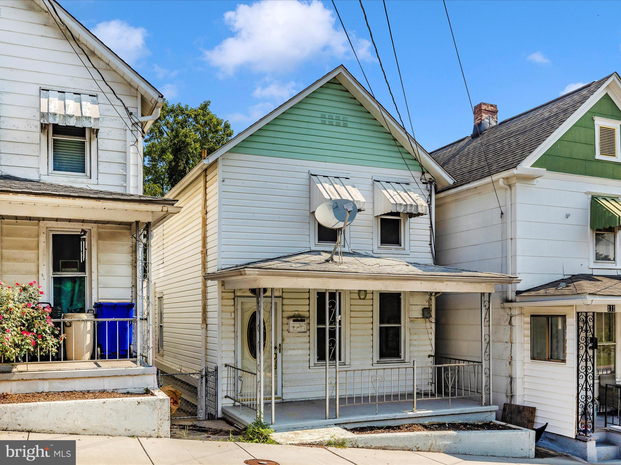 113 W B St