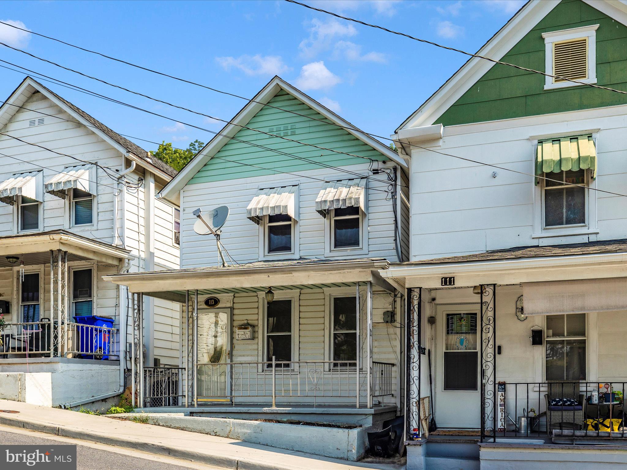 113 W B St