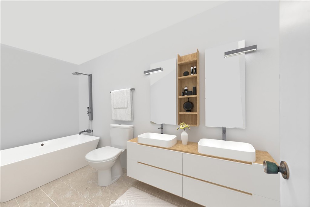 Modern bathroom with a soaking tub and double-sink vanity beneath two large mirrors.