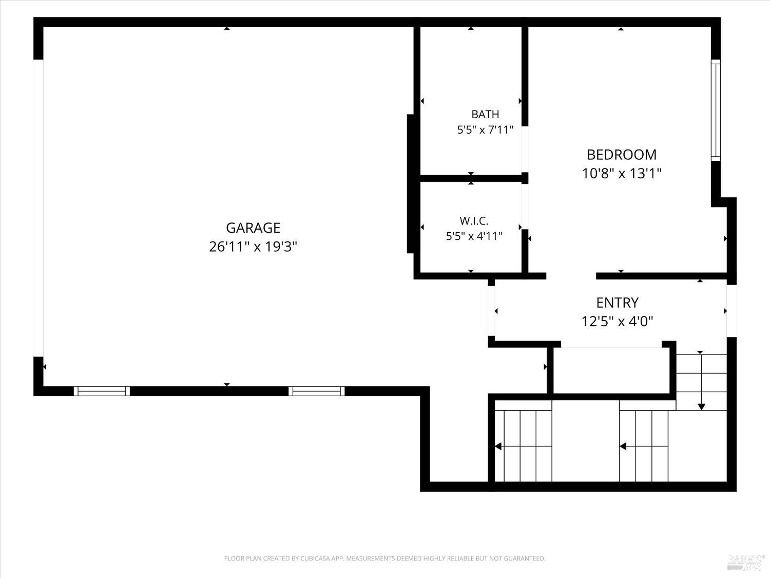 Floor plan showing a garage, bedroom, bathroom, walk-in closet, entry, and stairs.