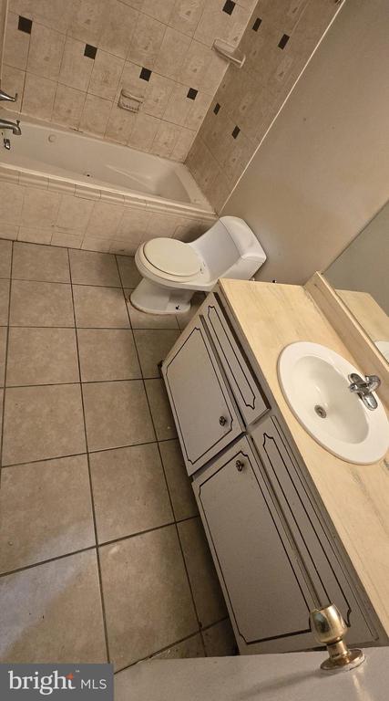 8673 GREENBELT ROAD Unit: T-1