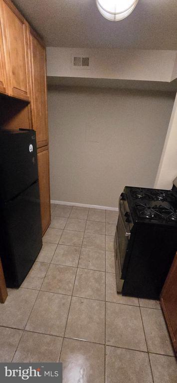 8673 GREENBELT ROAD Unit: T-1