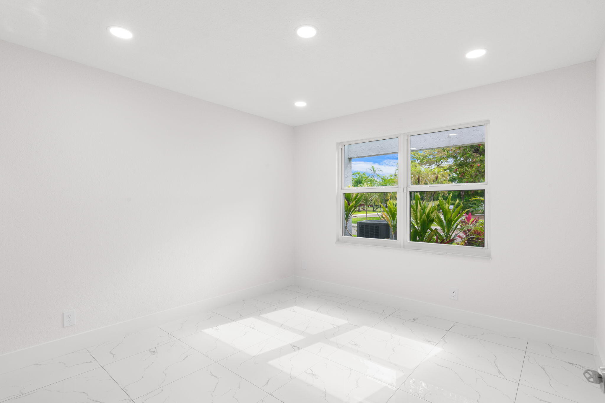 6702 N Pine Island Road 6702