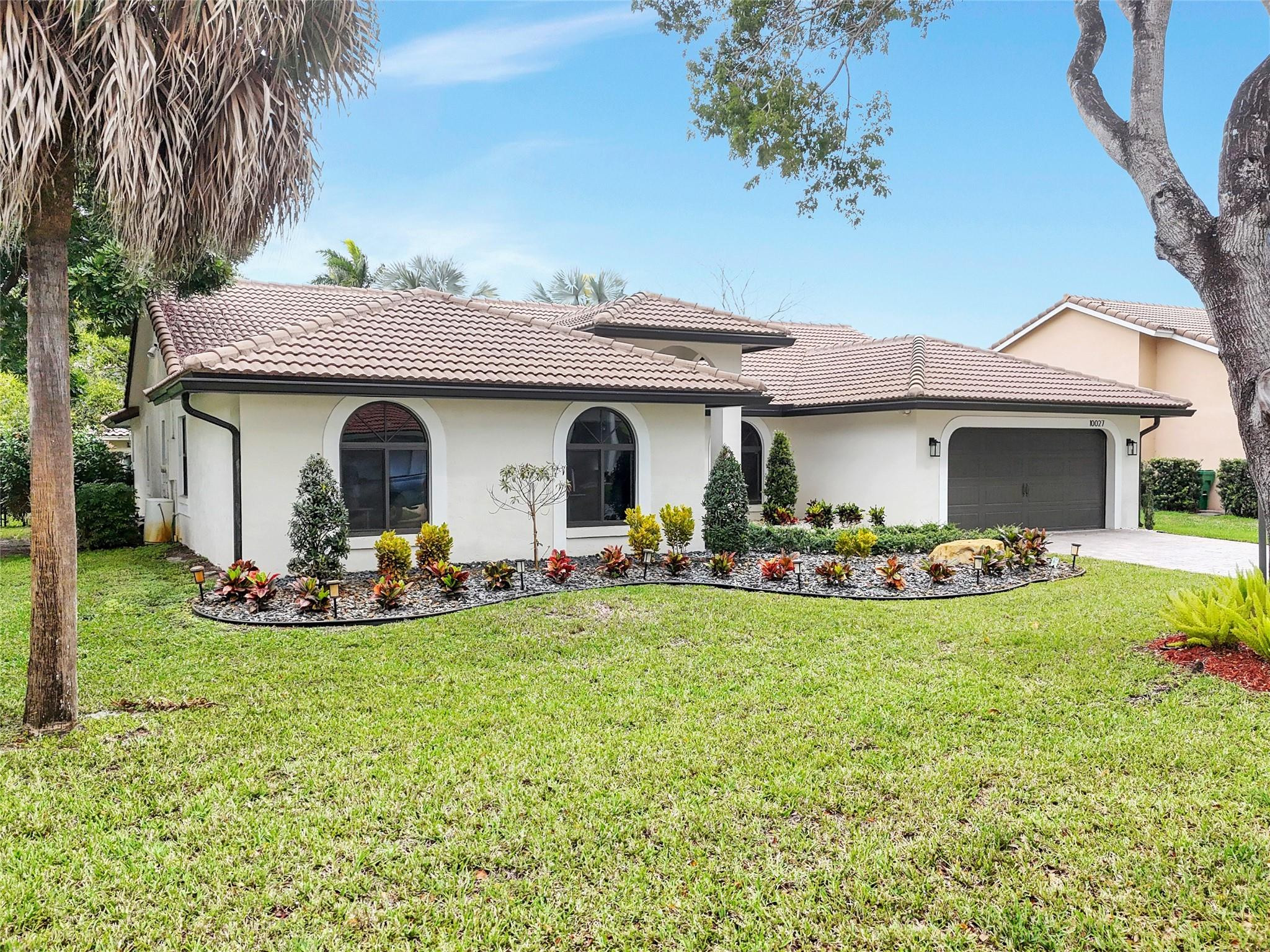 10027 NW 56th CT
