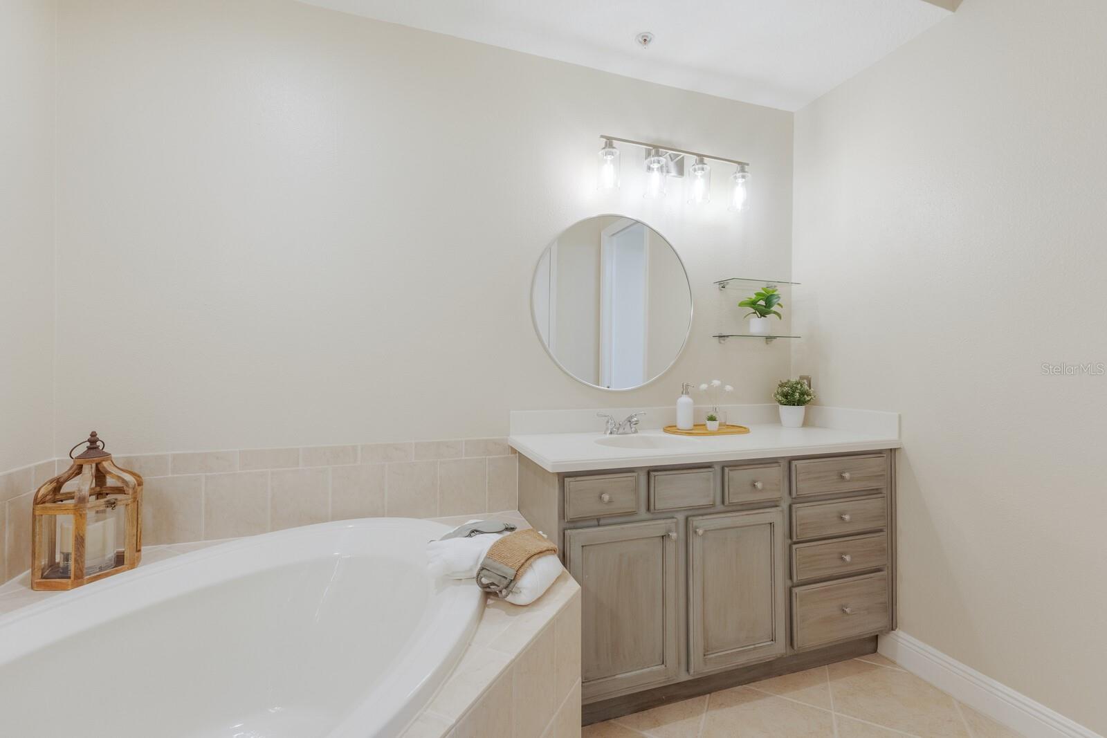 6409 MOORINGS POINT CIR #102