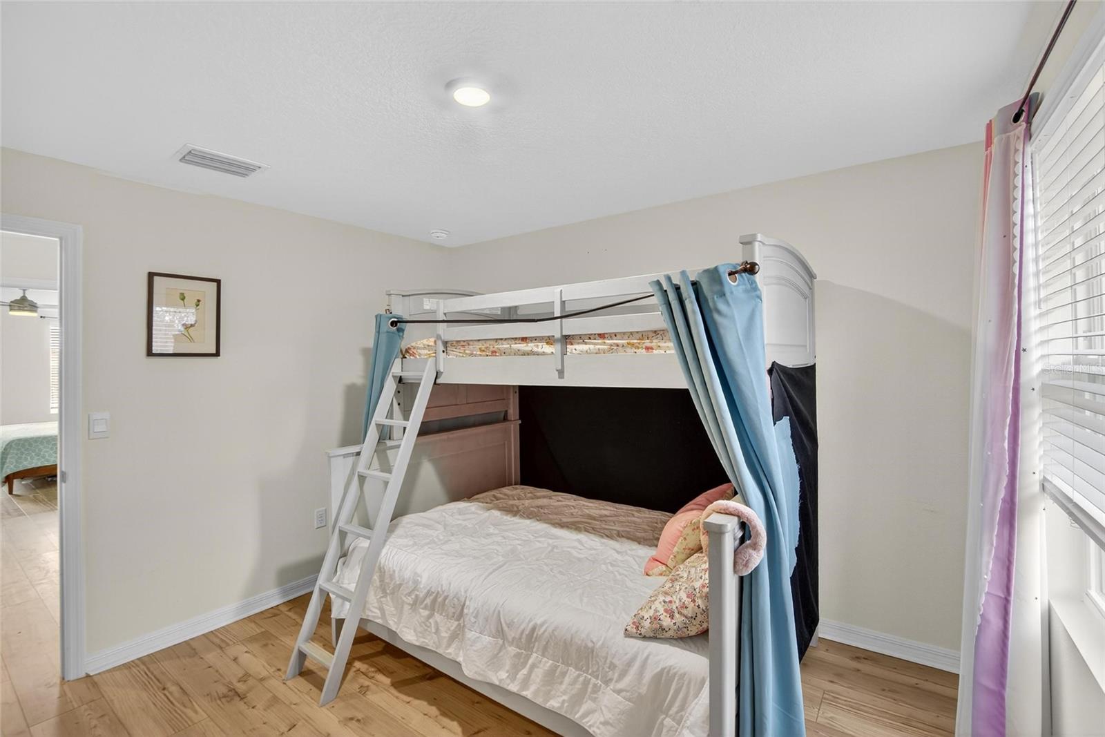 7751 ROSEWOOD GARDEN LOOP