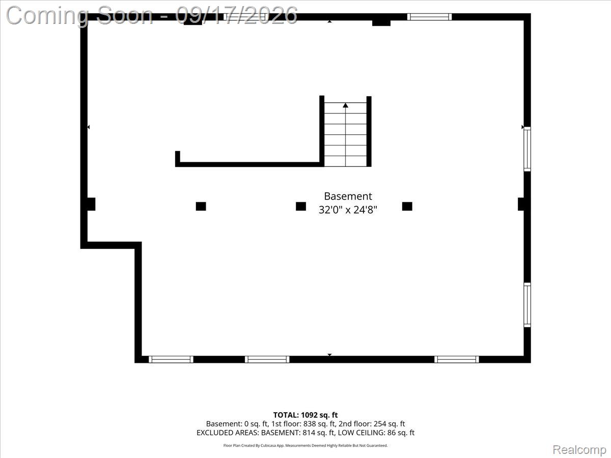 Basement floor plan labeled 32 by 24 feet 8 inches, with stairs and windows.