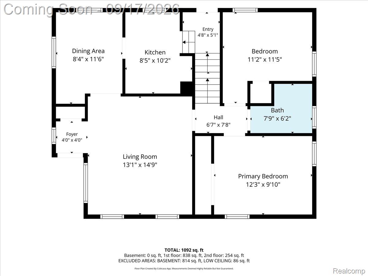 Floor plan showing two bedrooms, living room, kitchen, dining area, bath, and room dimensions.