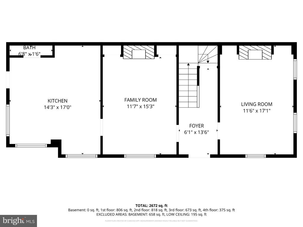 Floor plan showing the kitchen, family room, foyer, living room, bath, and staircase.