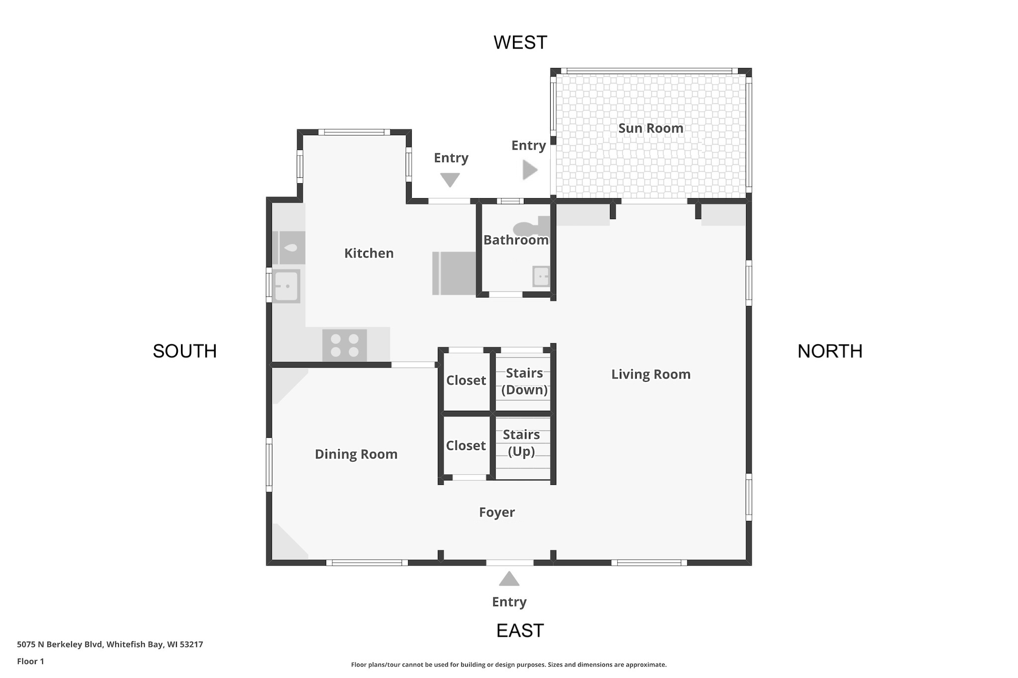 First-floor plan showing the kitchen, sun room, living and dining rooms, bathroom, foyer, closets, and stairs.