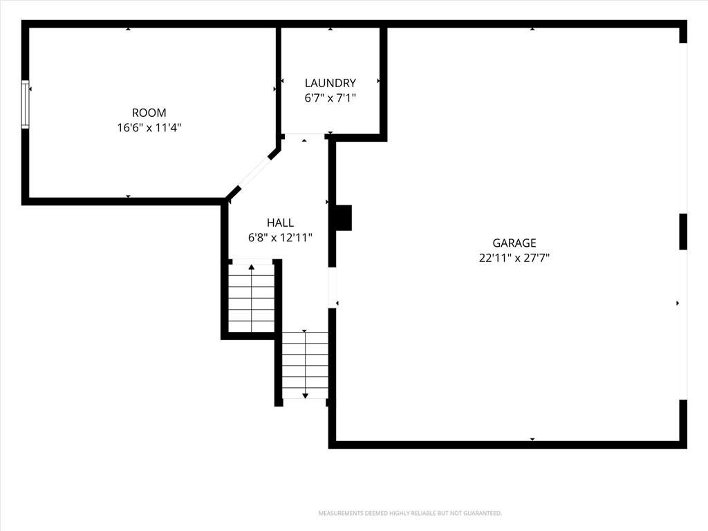 Floor plan with a room, laundry, hall and stairs, and a large garage.