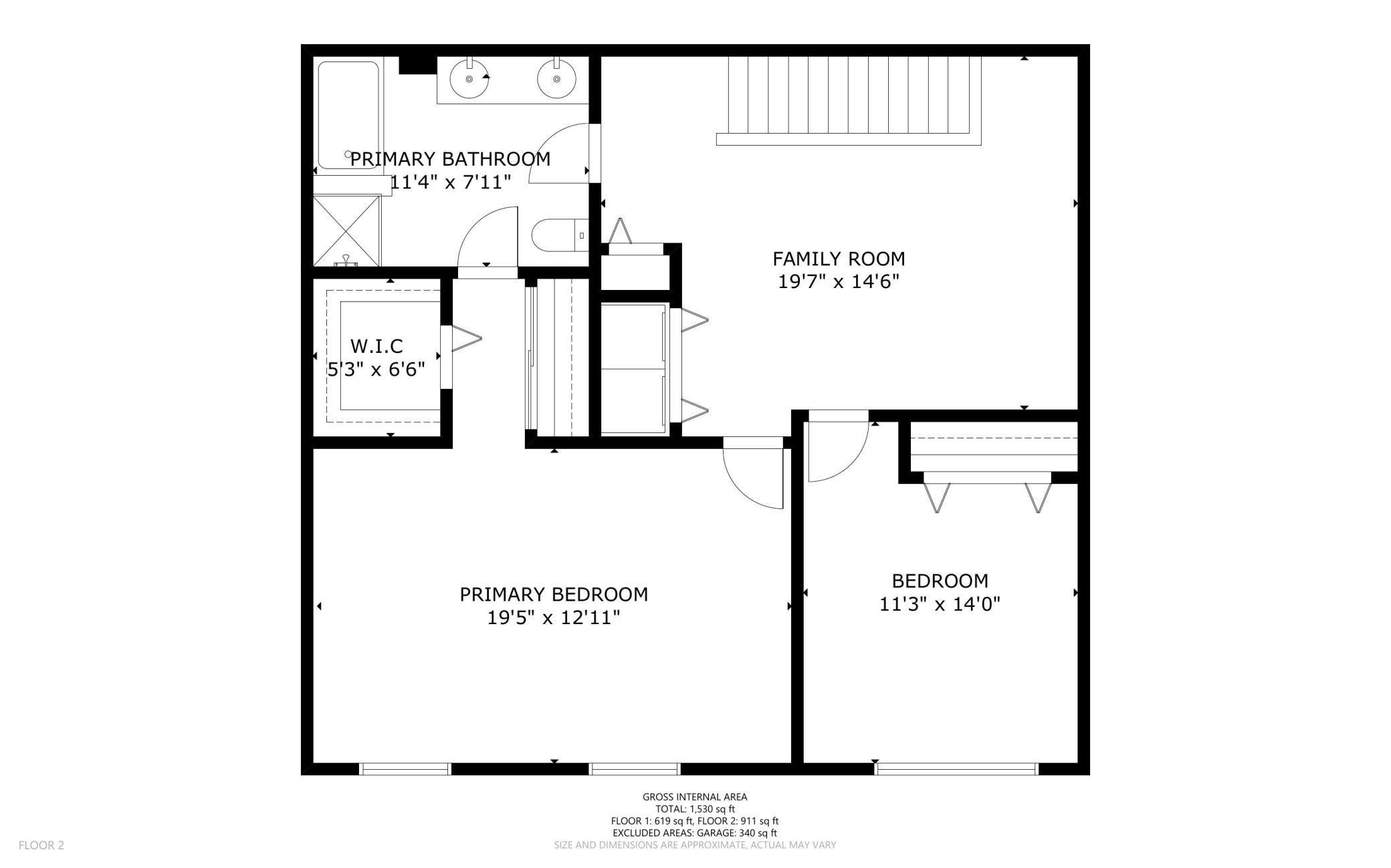 Second-floor plan showing two bedrooms, a family room, primary bathroom, and walk-in closet.
