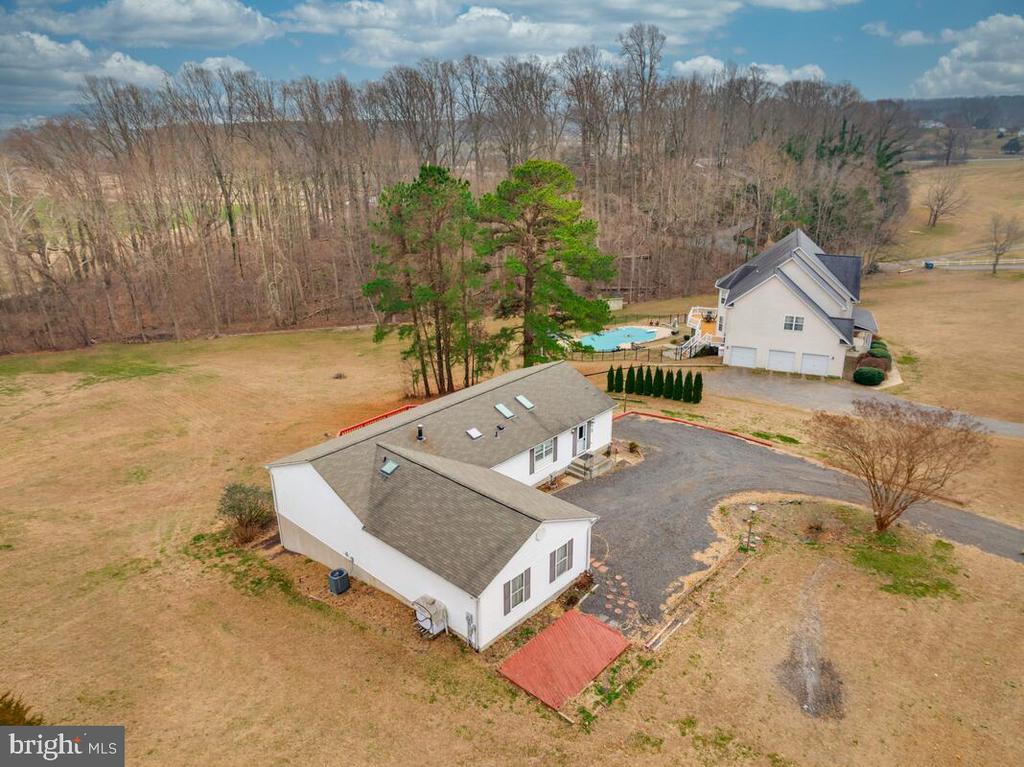 6984 BLUEBIRD HILL PLACE