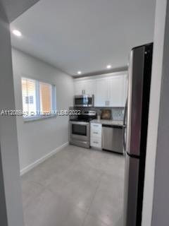 7732 Camino Real # 402