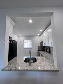 7732 Camino Real # 402