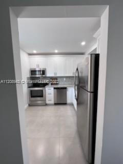 7732 Camino Real # 402