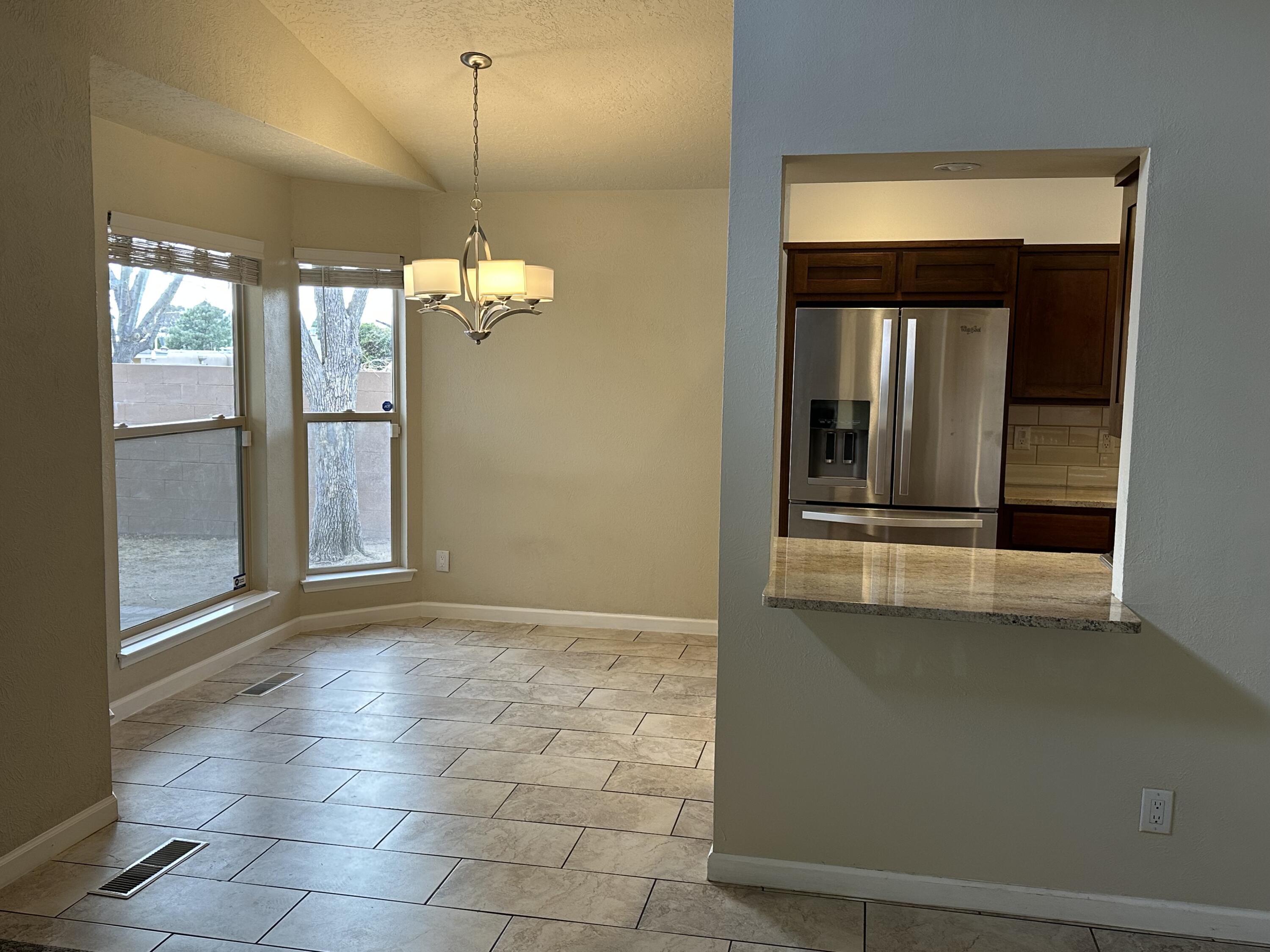 9908 ACADEMY HILLS Drive NE