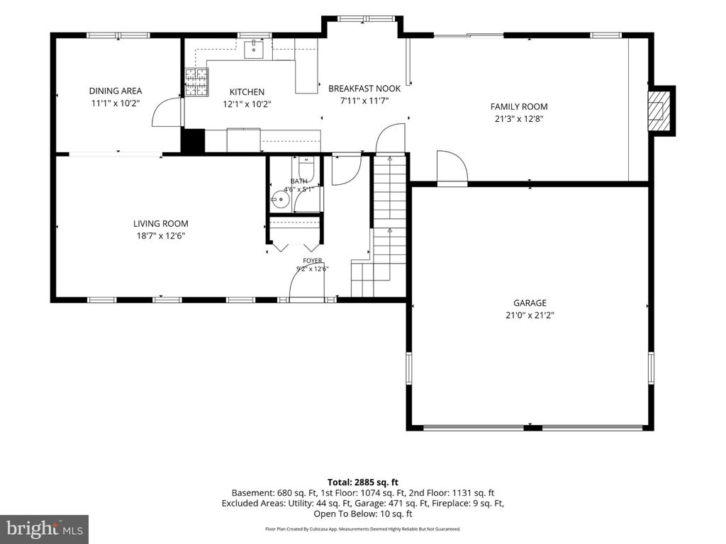 Floor plan showing labeled rooms, dimensions, and a two-car garage.