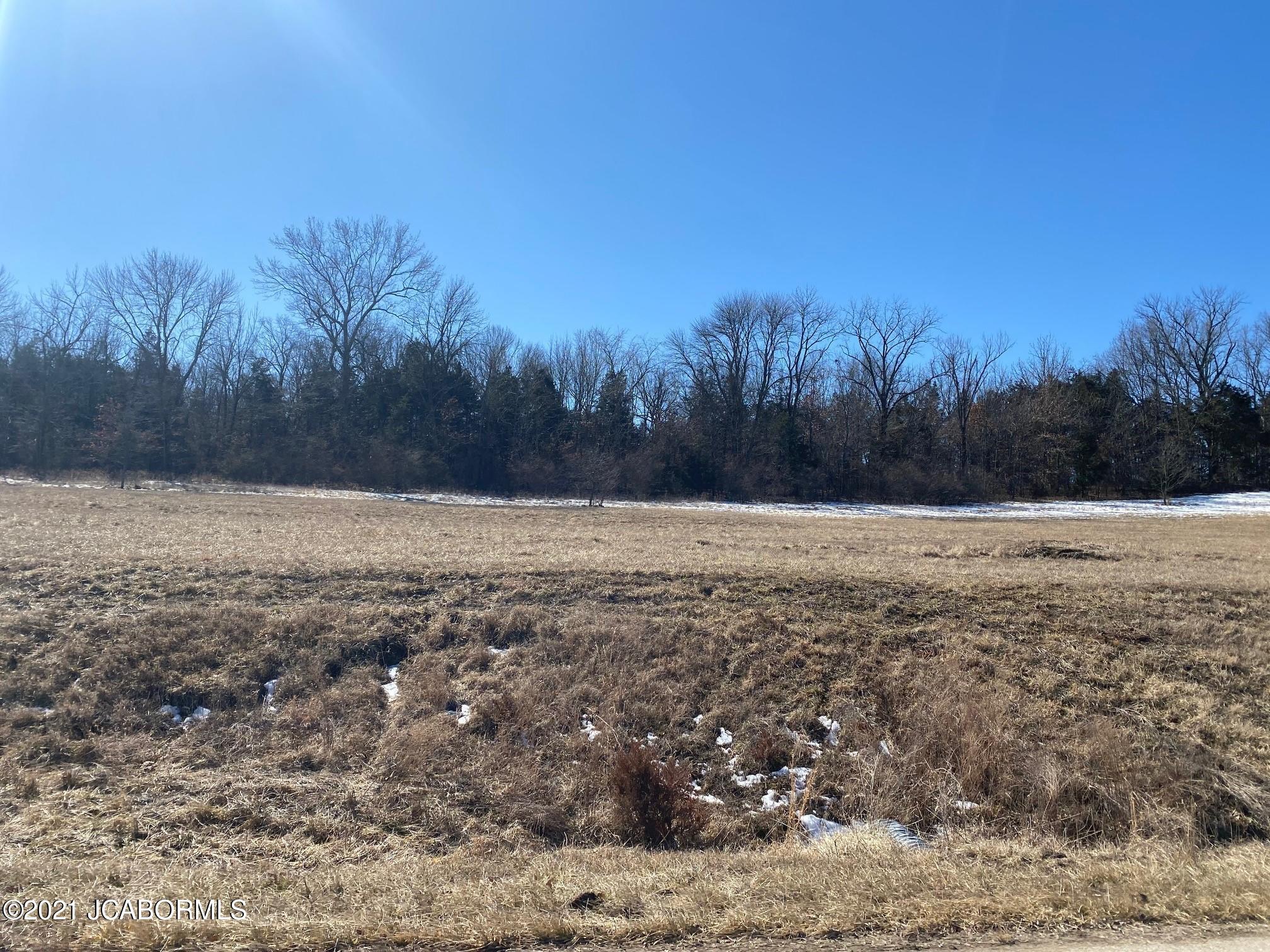 605 WHISPERING CEDARS LANE