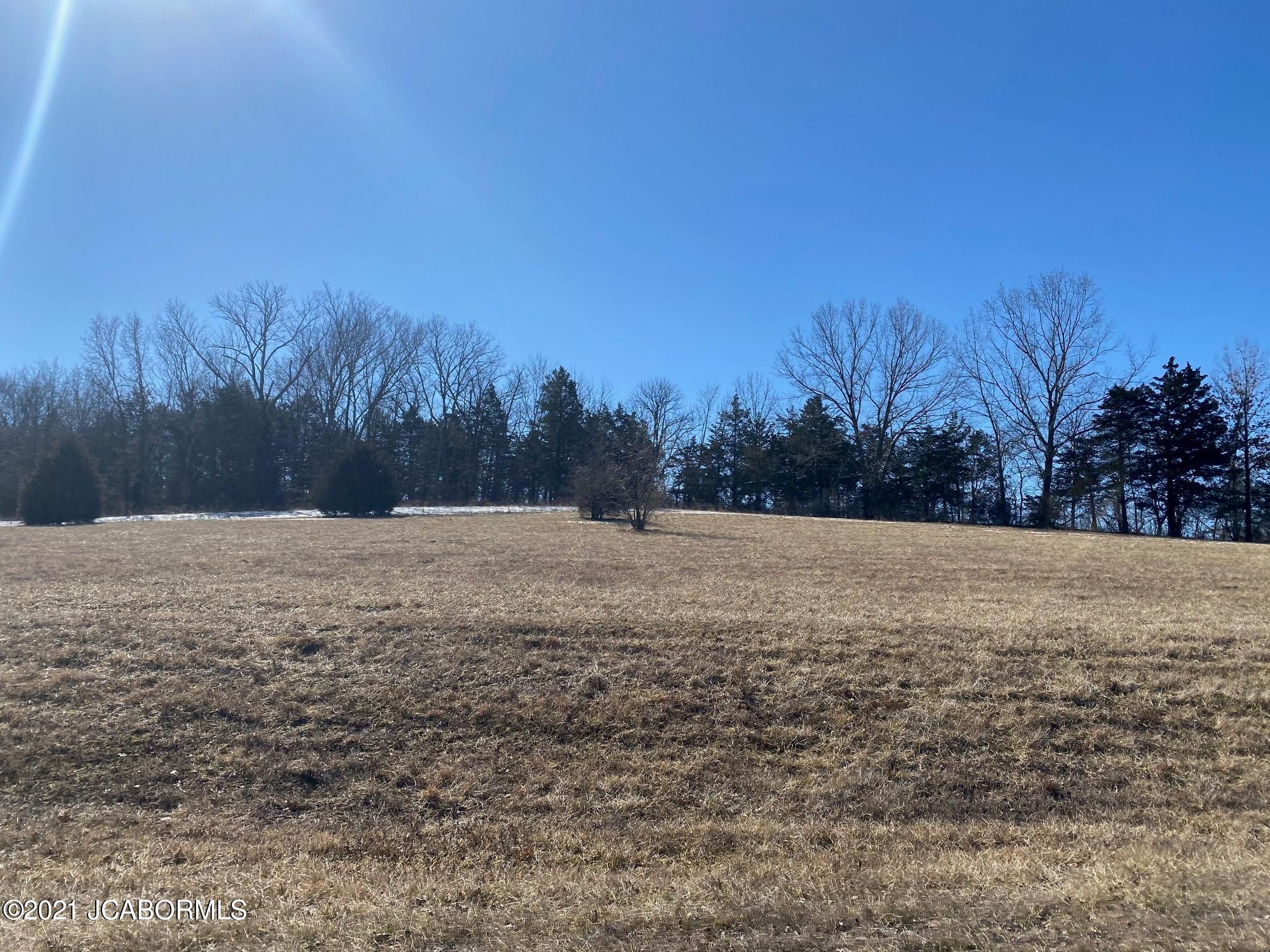 609 WHISPERING CEDARS LANE