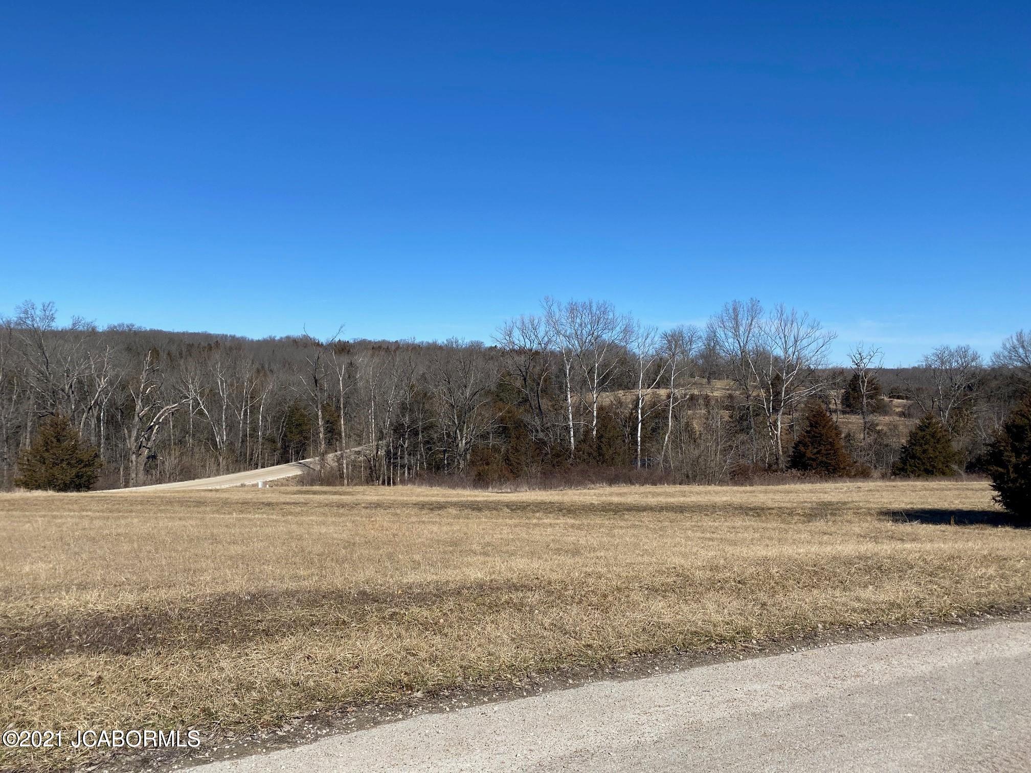 620 WHISPERING CEDARS LANE