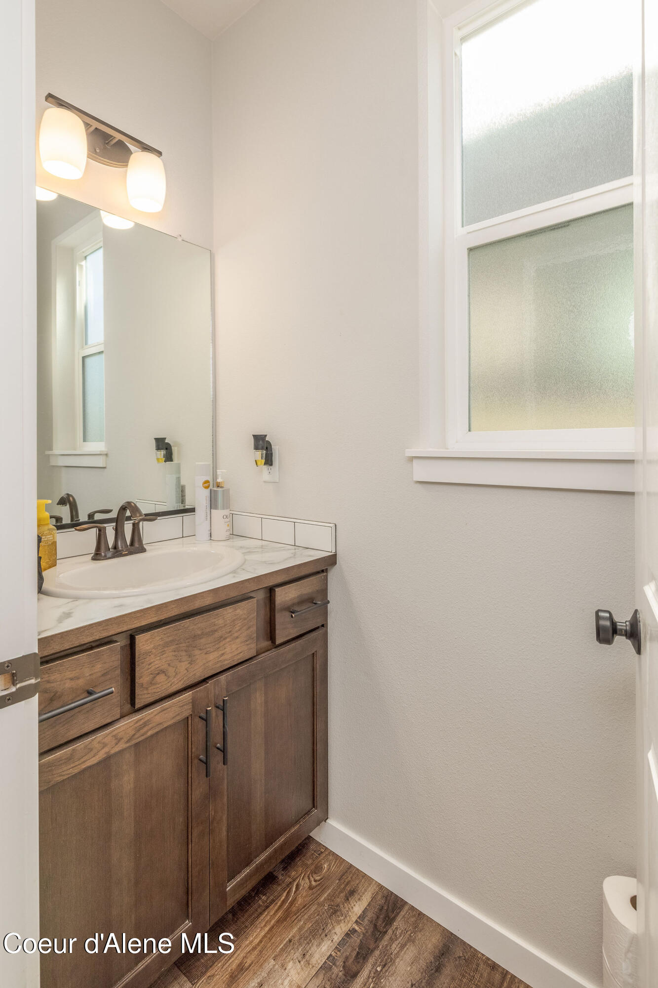 7028 N MADELLAINE DR