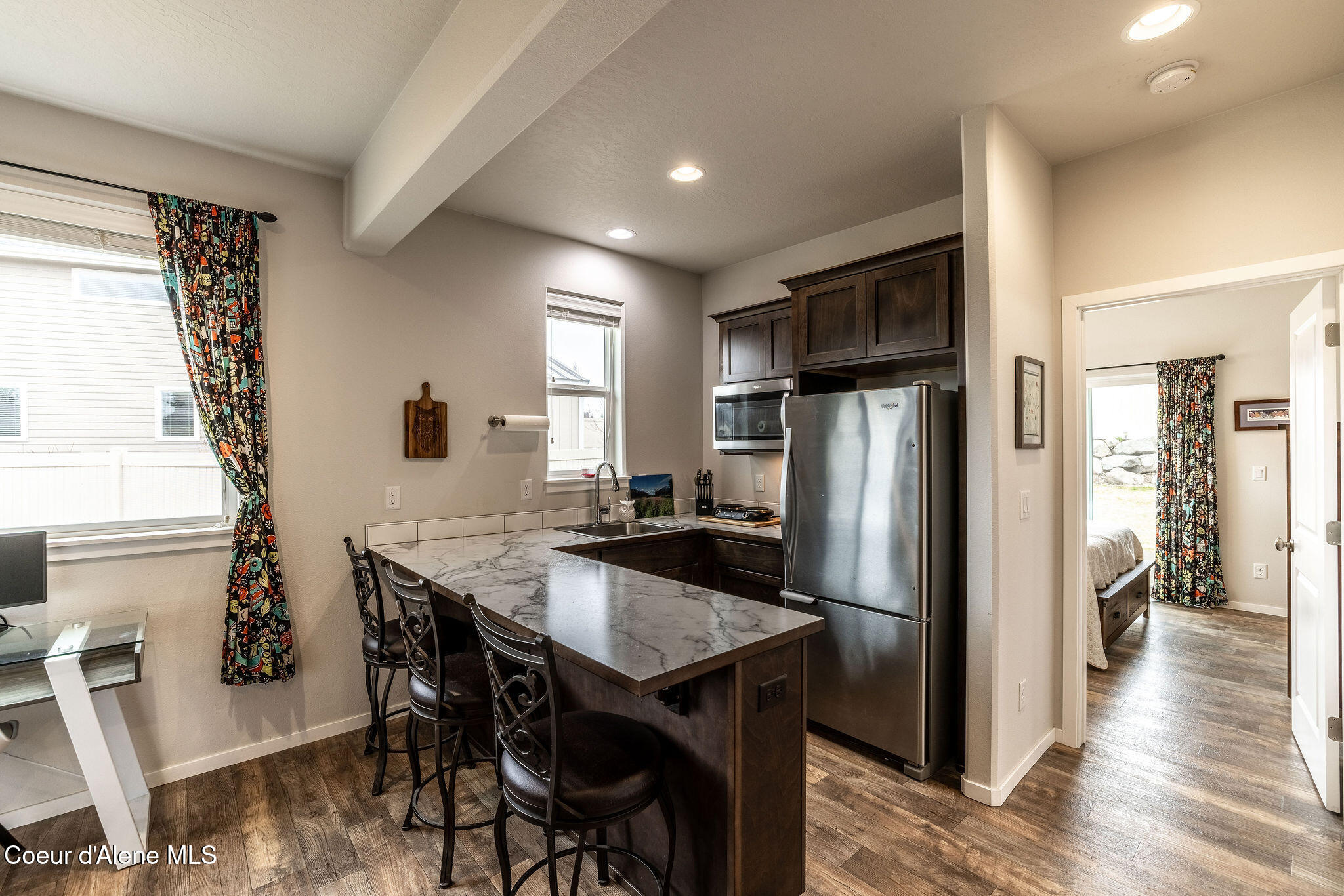 7028 N MADELLAINE DR