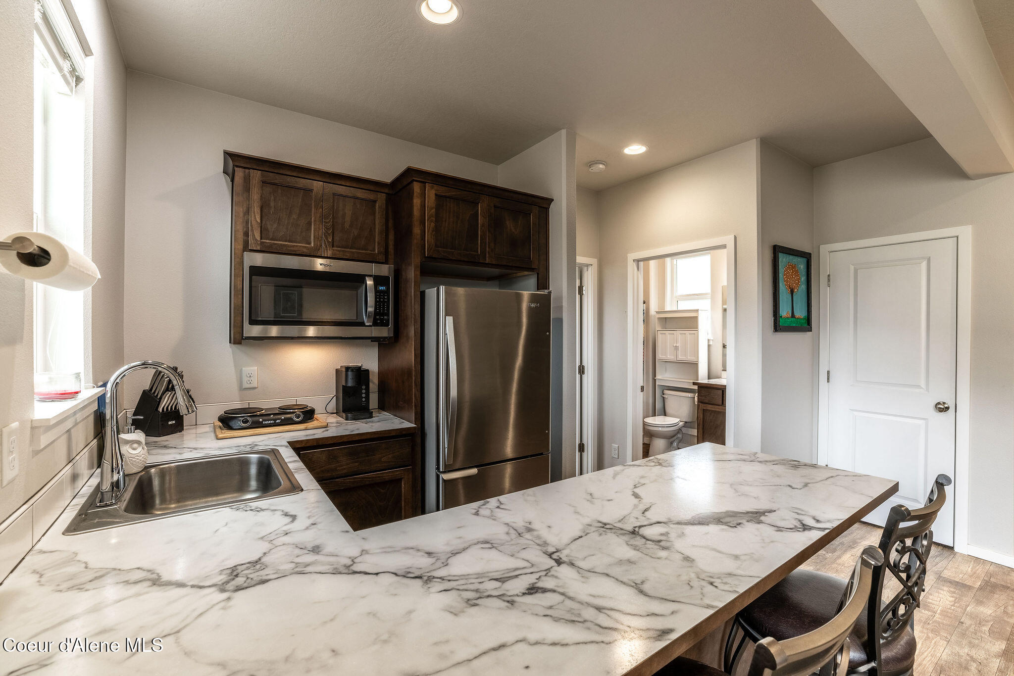 7028 N MADELLAINE DR